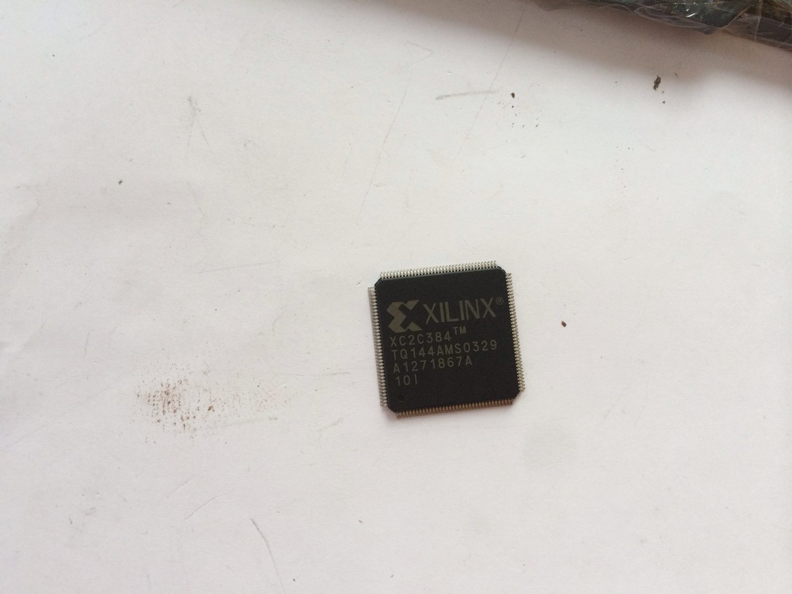 xc2c384tq144am