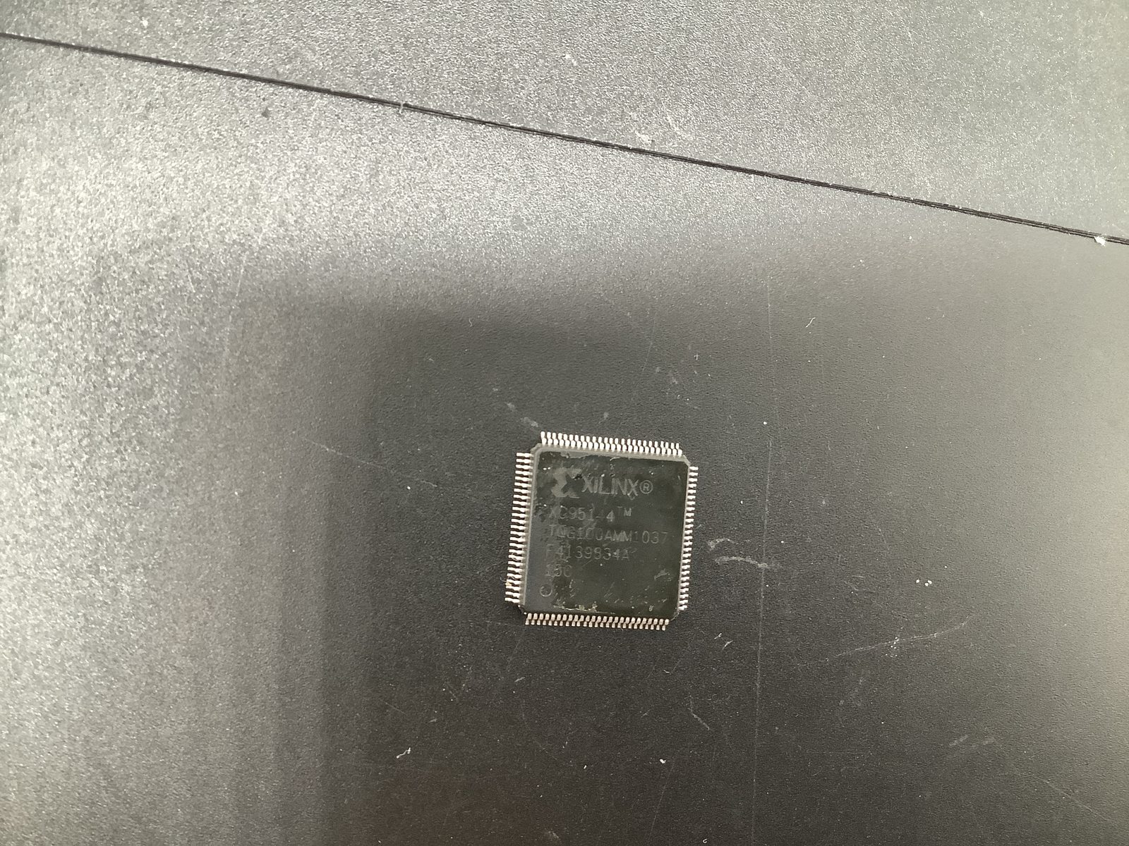 XC95144 TQG00AMM037